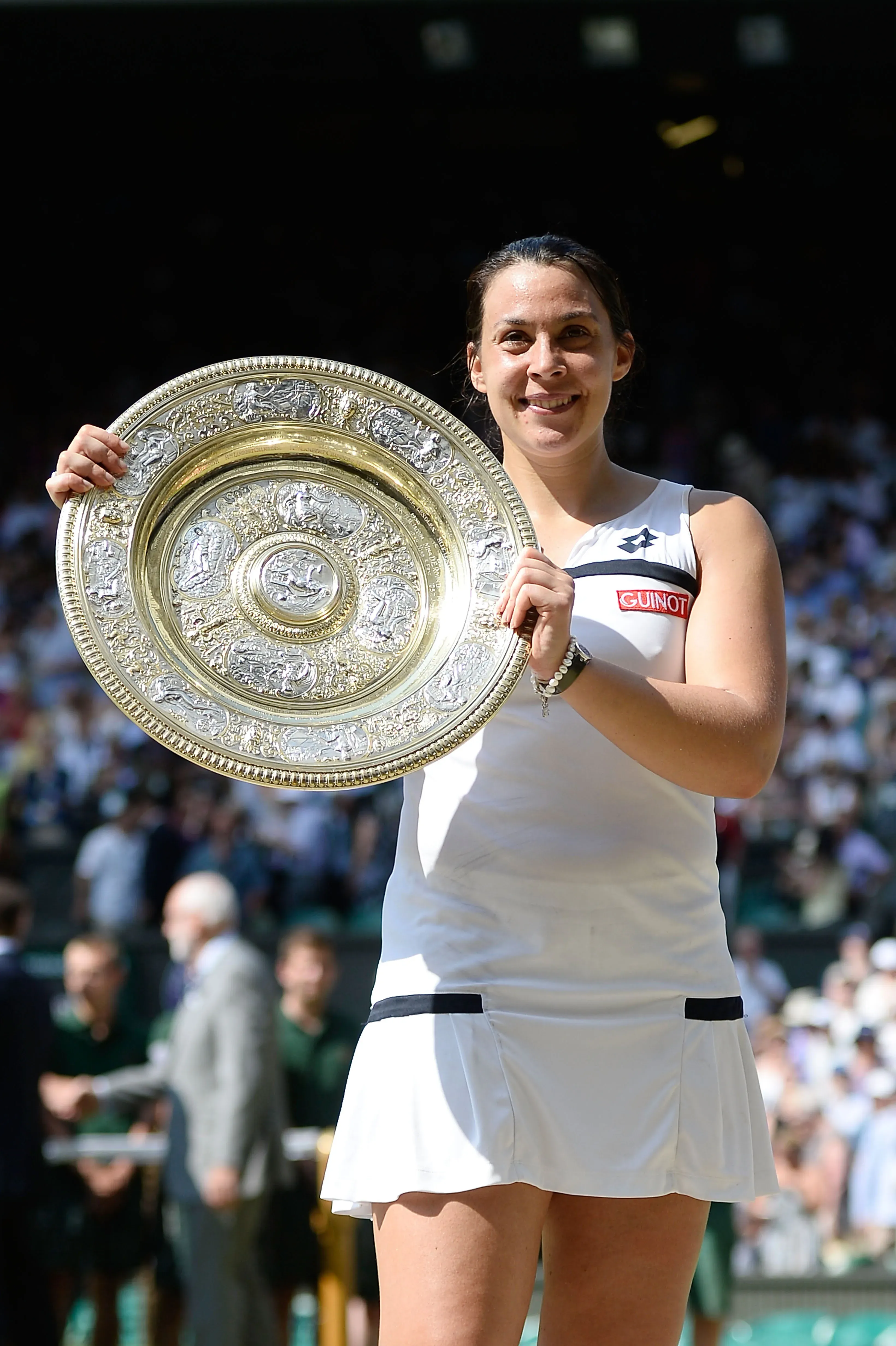 Marion Bartoli tras ganar Wimbledon en 2013. (Foto: Getty).