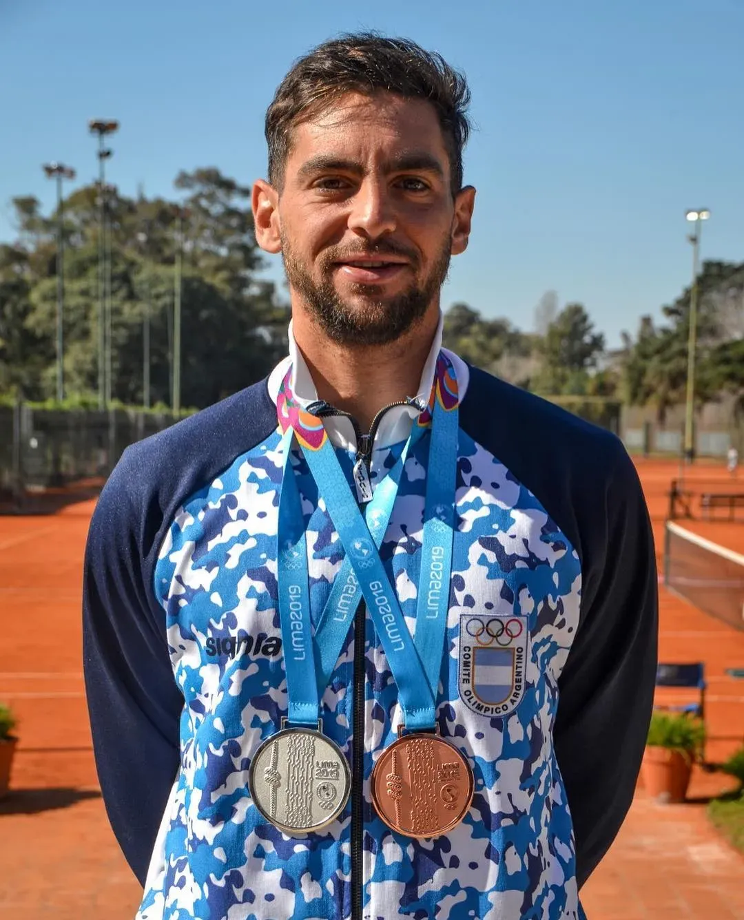 Andreozzi y sus medallas Panamericanas. Foto Guido Andreozzi.