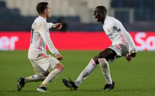 Lucas Vázquez e Mendy comemoram gol do Real Madrid contra o Atalanta. Foto: Getty Images