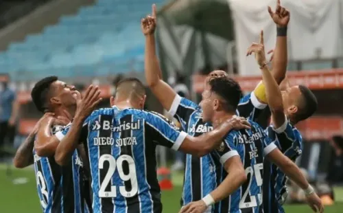 Jogadores do Grêmio comemoram gol ajoelhados. Foto: Getty Images