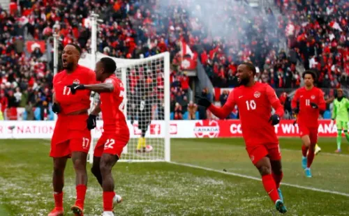 GettyImages/ Seleção do Canadá comemorando gol.