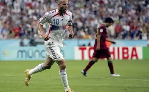 MUNICH, GERMANY - JULY 05: Zinedine Zidane #10 (L) of France celebrates after scoring the opening goal from the penalty spot during the FIFA World Cup Germany 2006 Semi-final match between Portugal and France at the Stadium Munich on July 5, 2006 in Munich, Germany. (Photo by Michael Steele/Getty Images)