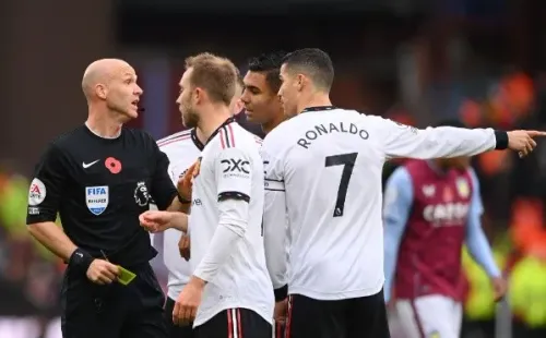 Stu Forster/Getty Images/ Eriksen e CR7.