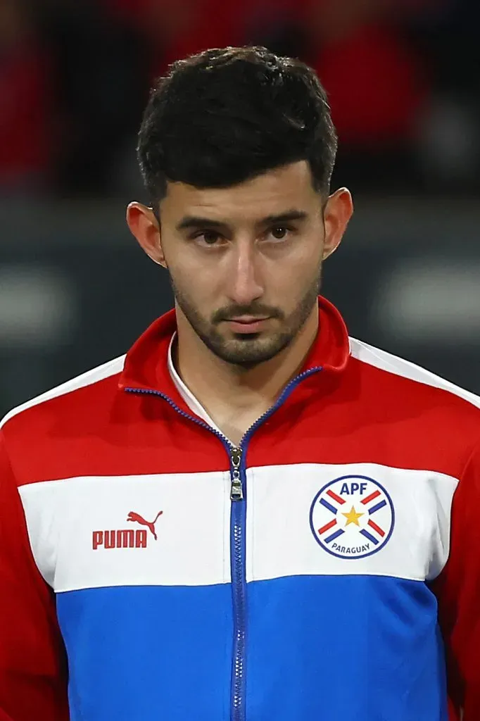 SANTIAGO, CHILE – NOVEMBER 16: Mathias Villasanti of Paraguay stands for the national anthem prior a FIFA World Cup 2026 Qualifier match between Chile and Paraguay at Estadio Monumental David Arellano on November 16, 2023 in Santiago, Chile. (Photo by Marcelo Hernandez/Getty Images)