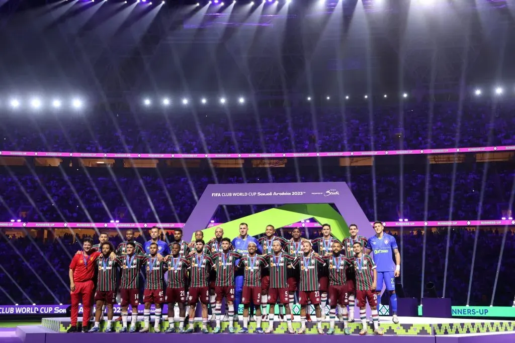 JEDDAH, SAUDI ARABIA – DECEMBER 22: Fernando Diniz, Head Coach of Fluminense, and players pose for a photo whilst wearing their Runners Up medals following the FIFA Club World Cup Saudi Arabia 2023 Final between Manchester City and Fluminense at King Abdullah Sports City on December 22, 2023 in Jeddah, Saudi Arabia. (Photo by Francois Nel/Getty Images)
