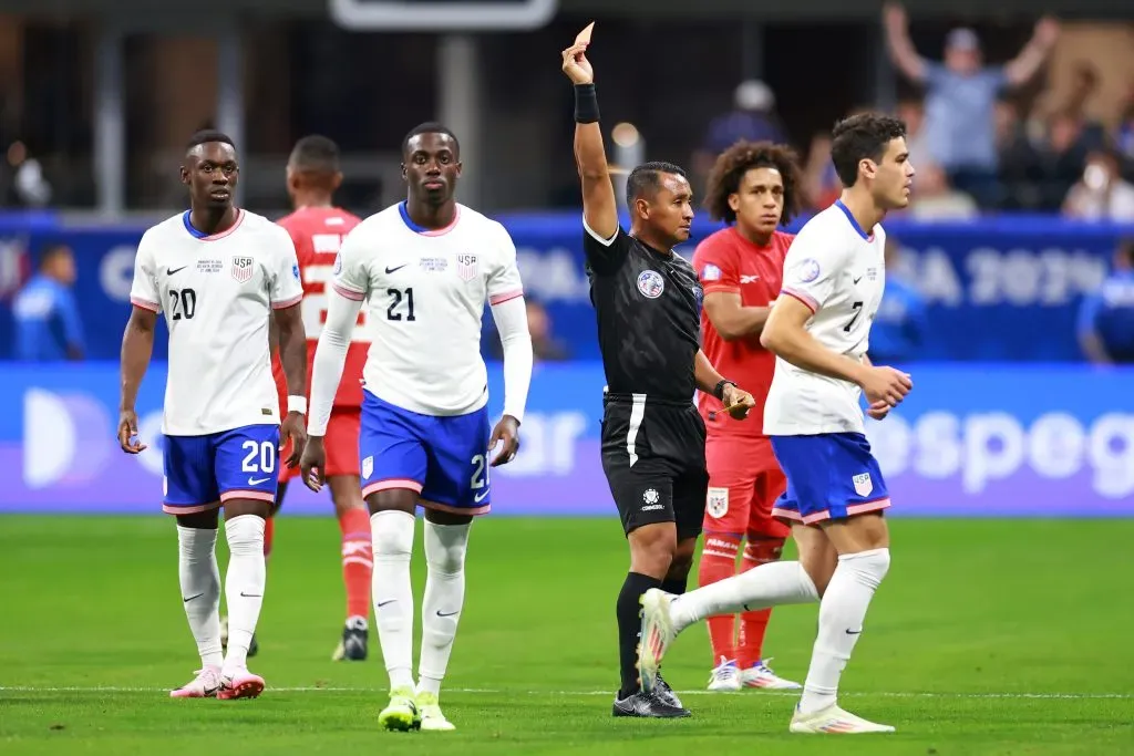 ATLANTA, GEORGIA – JUNE 27: Referee Ivan Barton shows a red card to Tim Weah of United States during the CONMEBOL Copa America USA 2024 Group C match between Panama and United States at Mercedes-Benz Stadium on June 27, 2024 in Atlanta, Georgia. (Photo by Hector Vivas/Getty Images)