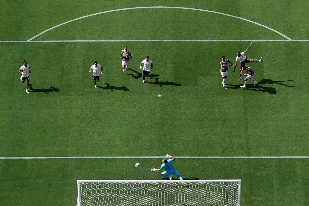 EAST RUTHERFORD, NEW JERSEY – JULY 08: Joao Pedro of Chelsea FC scores his team’s second goal past Fabio #1 of Fluminense FC during the FIFA Club World Cup 2025 semi-final match between Fluminense FC and Chelsea FC at MetLife Stadium on July 08, 2025 in East Rutherford, New Jersey. (Photo by Luke Hales/Getty Images)