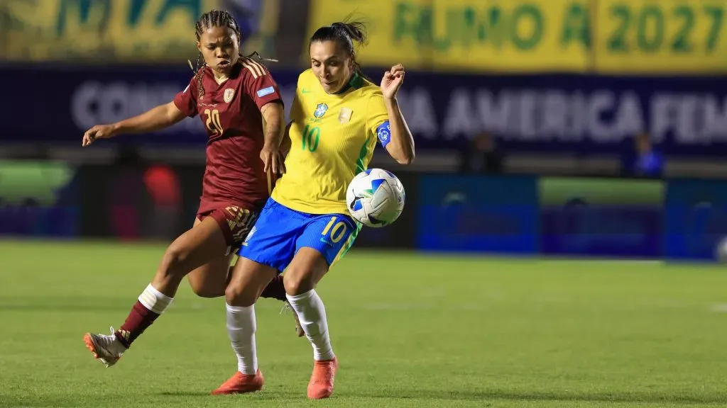 QUITO, ECUADOR – JULY 13: Marta Vieira of Brazil battles for possession against Dayana Rodriguez of Venezuela during the CONMEBOL Copa America Femenina 2025 match between Brazil and Venezuela at Estadio Gonzalo Pozo Ripalda on July 13, 2025 in Quito, Ecuador. (Photo by Franklin Jacome/Getty Images)