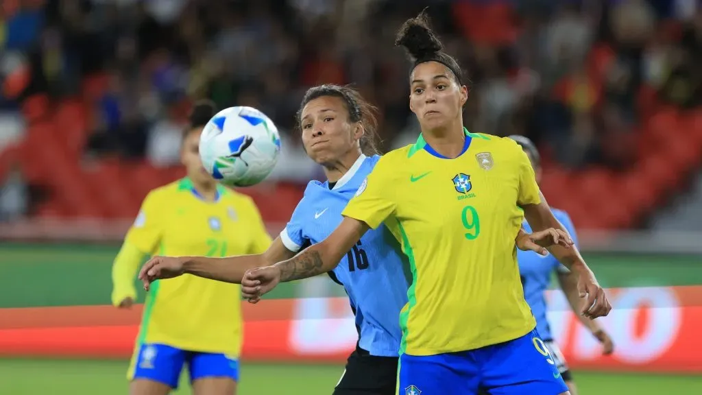 QUITO, ECUADOR – JULY 29: Amanda Gutierres of Brazil battles for possession against Yannel Correa of Uruguay during the CONMEBOL Copa America Femenina 2025 Semifinal match between Brazil and Uruguay at Rodrigo Paz Delgado Stadium on July 29, 2025 in Quito, Ecuador. (Photo by Franklin Jacome/Getty Images)