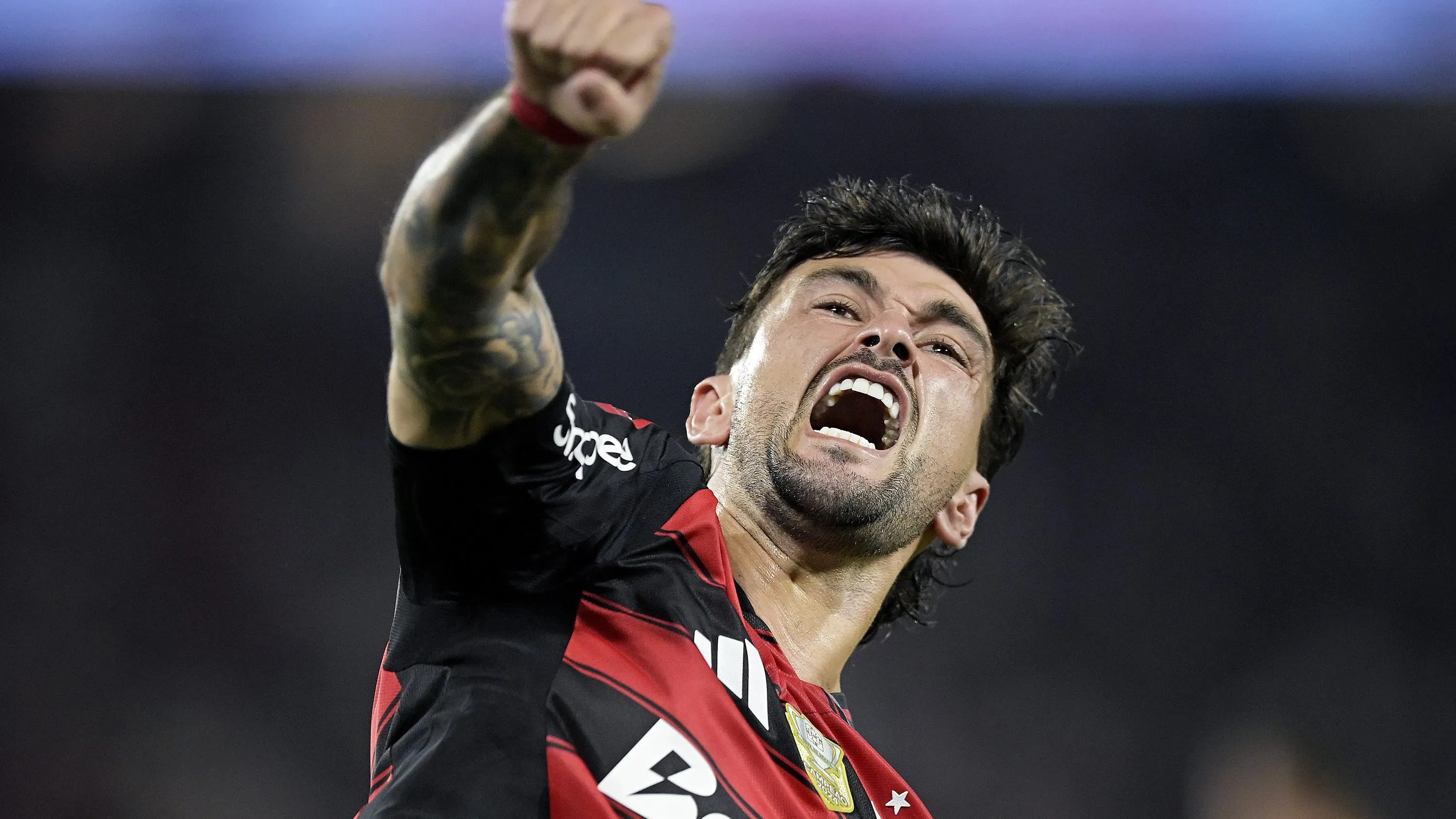 Arrascaeta comemorando pelo Flamengo. Foto: Alexandre Loureiro/AGIF