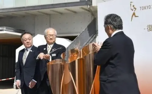 The Olympic flame will stay in Japan.