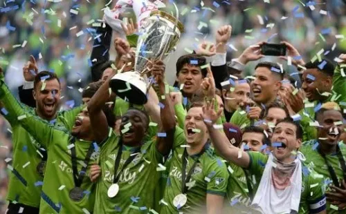 The Sounders celebrate after winning the MLS Cup.