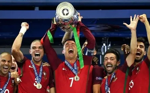 .Cristiano winning the European championship with Portugal.