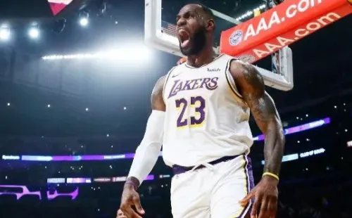 James is leading the league with 10.1 assists per game. (Getty)