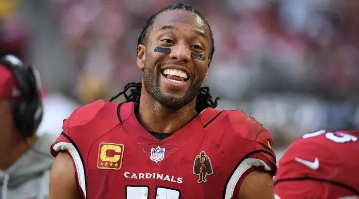 Larry Fitzgerald of the Arizona Cardinals smiles after scoring a touchdown against the New York Giants. (Getty)