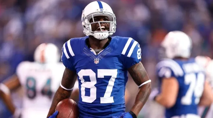 Reggie Wayne of the Indianapolis Colts celebrates after making a touchdown against the Miami Dolphins. (Getty)