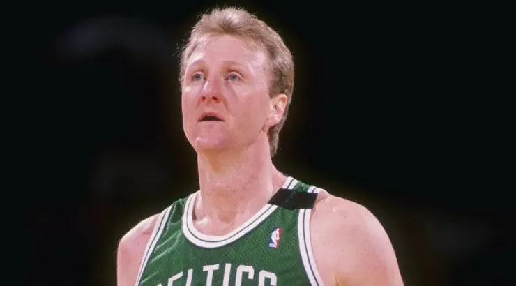 Larry Bird of the Boston Celtics stands on the court during a game. (Getty)