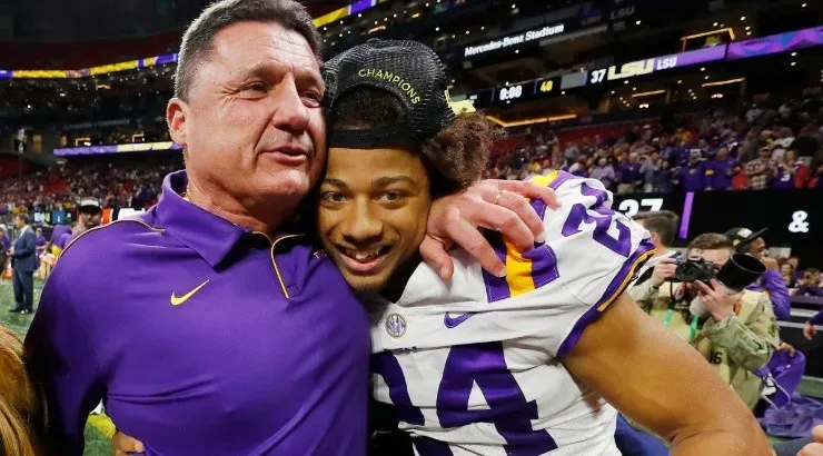 Head coach Ed Orgeron of the LSU Tigers celebrates with Derek Stingley Jr. (Getty)