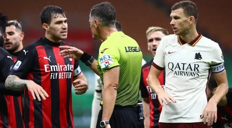 Alessio Romagnoli (left) of Milan and Edin Dzeko of Roma (right). (Getty)