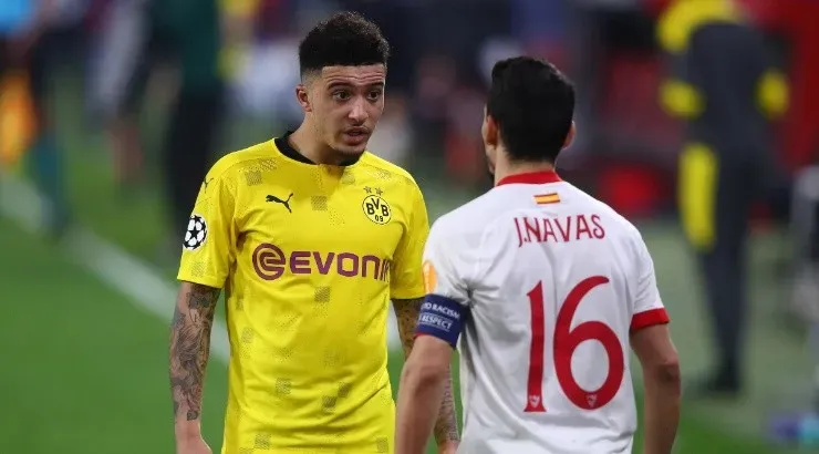 Jadon Sancho (left) of Borussia Dortmund interacts with Jesus Navas (right) of Sevilla. (Getty)