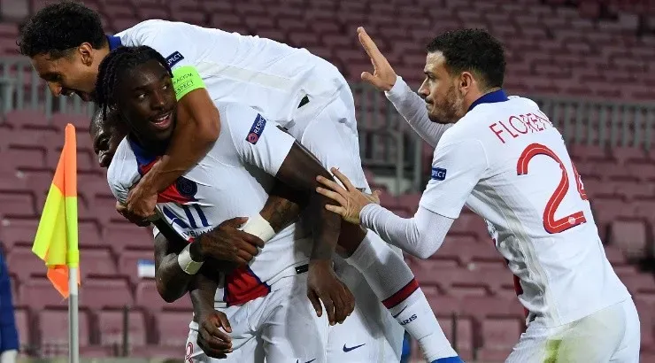 Moise Keane (centre) of Paris Saint-Germain celebrates with teammates Marquinhos (left) and Alessandro Florenzi (right). (Getty)