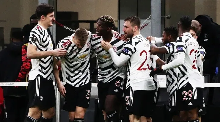 Manchester United players celebrate after a goal against Milan. (Getty)