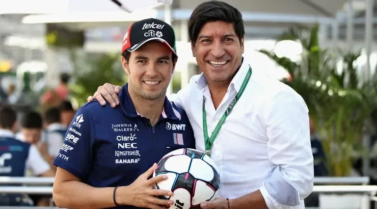 Sergio Perez (left) of Mexico meets Chilean football legend Ivan Zamorano (right). (Getty)