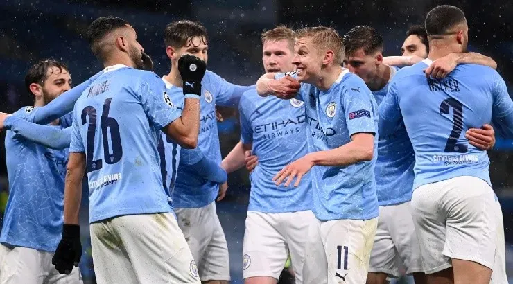 Manchester City players celebrate after a goal. (Getty)