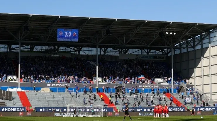 A limited amount of fans in the 2020/21 Bundesliga playoff between Holstein Kiel and FC Koln. (Getty)