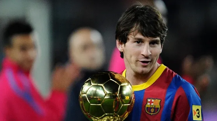 Lionel Messi with the Ballon dāOr in 2011. (Getty)