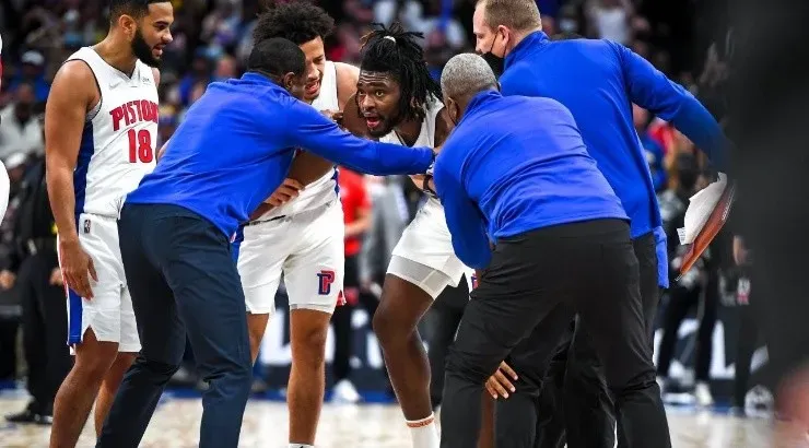 Isaiah Stewart #28 of the Detroit Pistons is restrained after receiving a blow to the face by LeBron James #6 of the Los Angeles Lakers (Photo by Nic Antaya/Getty Images)