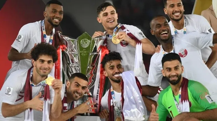 Qatar players celebrates the win with cup during the AFC Asian Cup final (Photo by Kaz Photography/Getty Images)