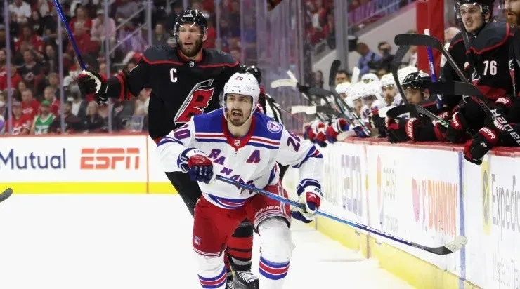 Jordan Staal #11 of the Carolina Hurricanes skates against Chris Kreider #20 of the New York Rangers (Photo by Bruce Bennett/Getty Images)