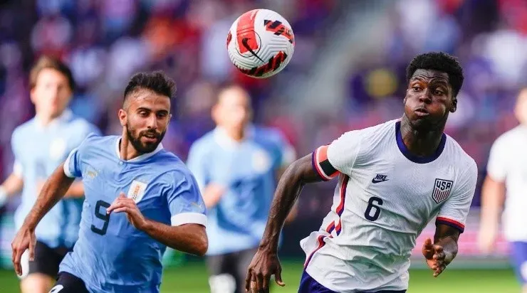 Yunus Musah #6 of the United States collects a long pass as Diego Rossi #9 of Uruguay (Photo by Kyle Rivas/Getty Images)