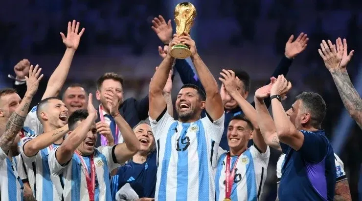 Sergio Aguero, former Argentina player lifts the FIFA World Cup Qatar 2022 Winner’s Trophy after the FIFA World Cup Qatar 2022 Final match between Argentina and France at Lusail Stadium on December 18, 2022 in Lusail City, Qatar. (Photo by Dan Mullan/Getty Images)