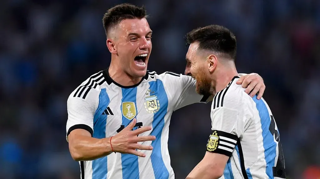 Giovani Lo Celso and Lionel Messi of Argentina