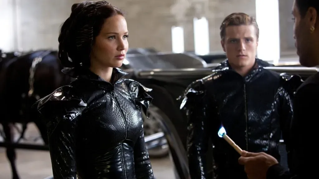 Lenny Kravitz, Josh Hutcherson and Jennifer Lawrence in The Hunger Games.