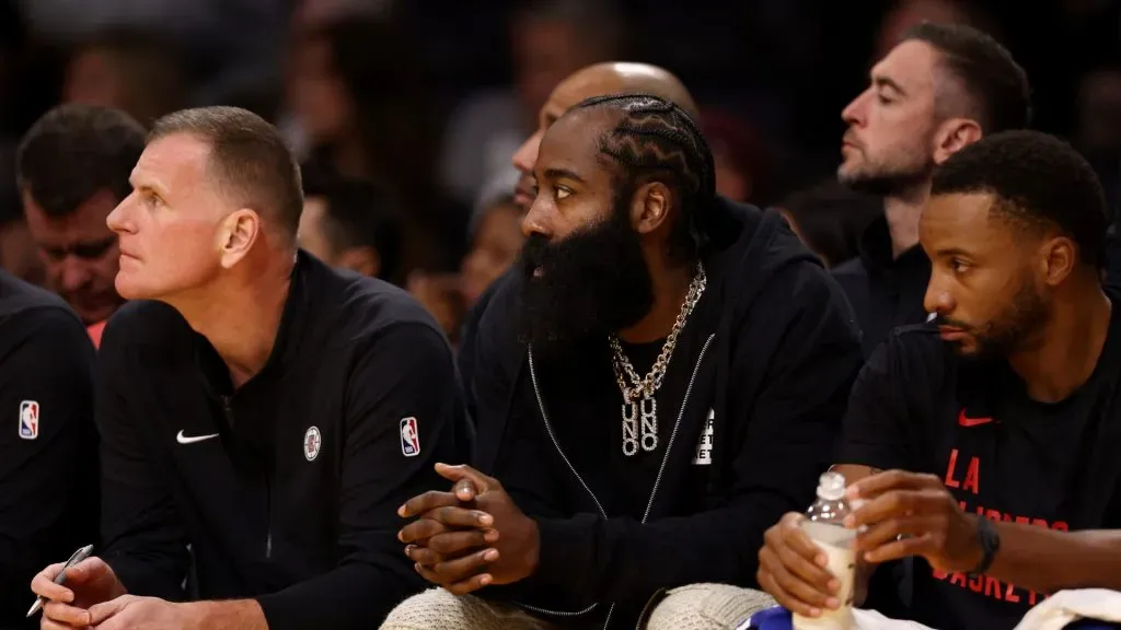 James Harden looks on from the bench during a game against the Los Angeles Lakers