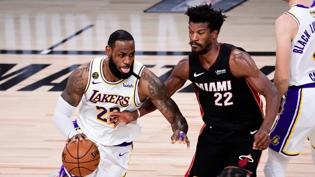 LeBron James drives to the basket against Jimmy Butler in Game Three of the 2020 NBA Finals