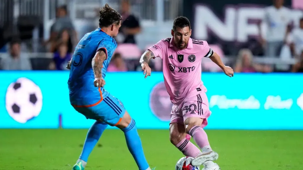 Lionel Messi of Inter Miami CF controls the ball against Birk Risa of the New York City FC.