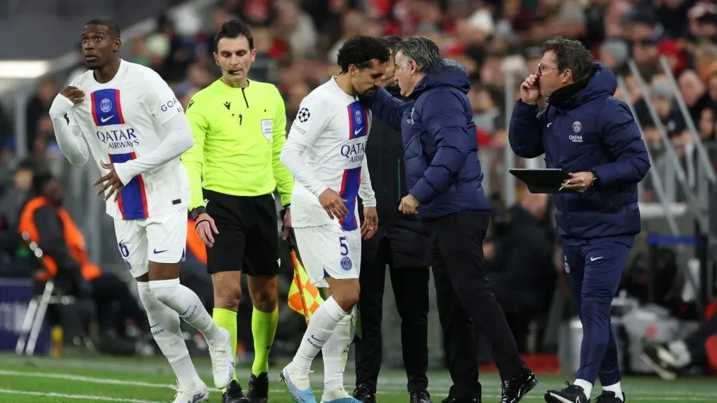 Marquinhos of Paris Saint-Germain is embraced by Christophe Galtier, Head Coach of Paris Saint-Germain, as he’s substituted off after going down with an injury during the UEFA Champions League round of 16 leg two match between FC Bayern München and Paris Saint-Germain at Allianz Arena on March 08, 2023 in Munich, Germany. (Photo by Alex Grimm/Getty Images)