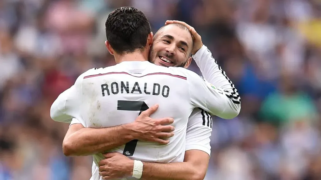 Cristiano Ronaldo of Real Madrid CF celebrates with his teammate Karim Benzema of Real Madrid CF after scoring his team's third goalduring the La Liga match between RC Deportivo La Coruna and Real Madrid CF at Riazor Stadium on September 20, 2014 in La Coruna, Spain.