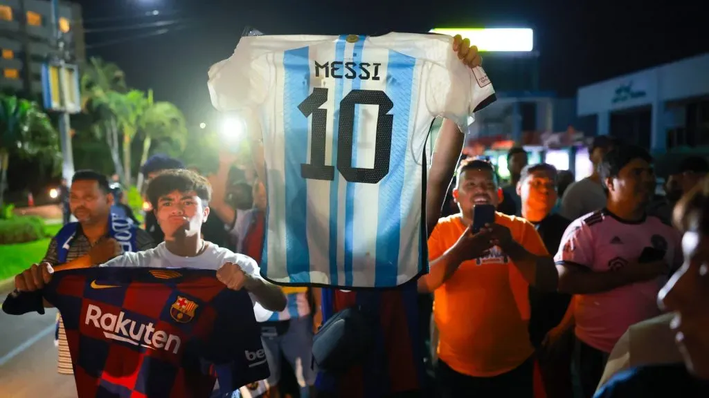 Fans hold Lionel Messi t-shirts before the arrival of the Inter Miami team buses at the Real Intercontinental Hotel prior to the friendly game against the El Salvador National Team on January 19, 2024 in San Salvador, El Salvador.