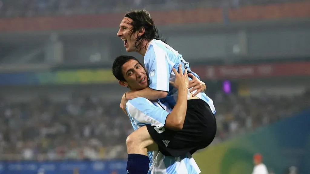 Lionel Messi of Argentina celebrates the first goal with teammate Angel Di Maria during the Men’s Quarter Final match between Argentina and Netherlands at Shanghai Stadium on Day 8 of the Beijing 2008 Olympic Games on August 16, 2008 in Shanghai, China.