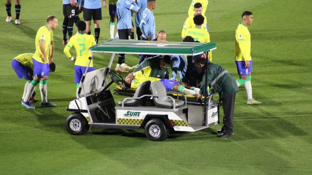 Neymar being carted off the field in the Uruguay-Brazil game