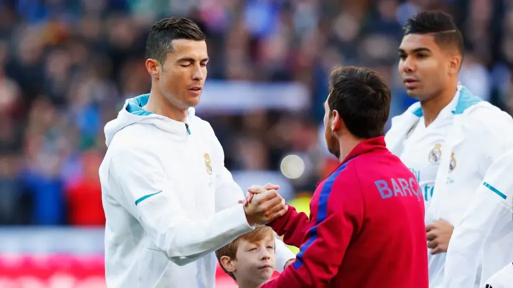 Cristiano Ronaldo greets Lionel Messi prior to a La Liga match between Real Madrid and Barcelona in 2017.