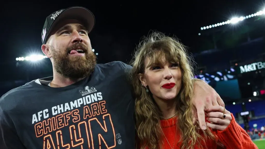 Travis Kelce #87 of the Kansas City Chiefs (L) celebrates with Taylor Swift after defeating the Baltimore Ravens in the AFC Championship Game at M&T Bank Stadium on January 28, 2024 in Baltimore, Maryland.