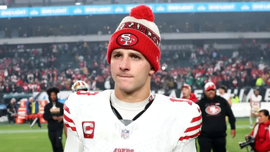 Brock Purdy #13 of the San Francisco 49ers walks on the field after a win over the Philadelphia Eagles at Lincoln Financial Field on December 03, 2023 in Philadelphia, Pennsylvania.