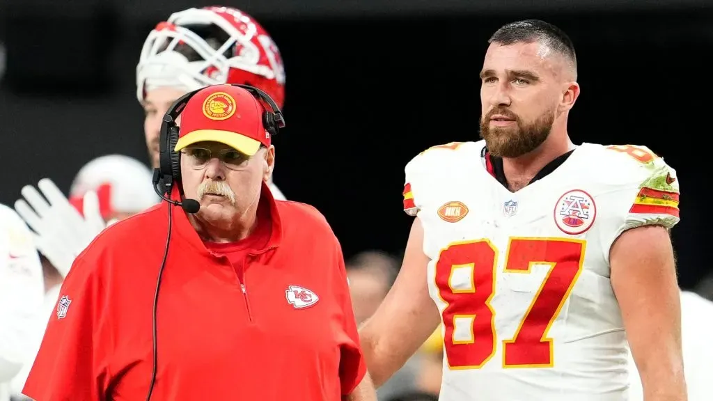 Head coach Andy Reid and Travis Kelce #87 of the Kansas City Chiefs look on during the second quarter of a game against the Las Vegas Raiders at Allegiant Stadium on November 26, 2023 in Las Vegas, Nevada.