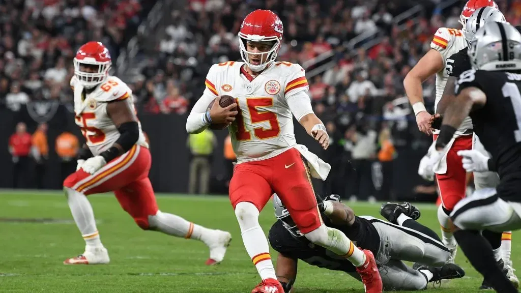 Patrick Mahomes of the Kansas City Chiefs runs with the ball during the fourth quarter of the game against the Las Vegas Raiders.